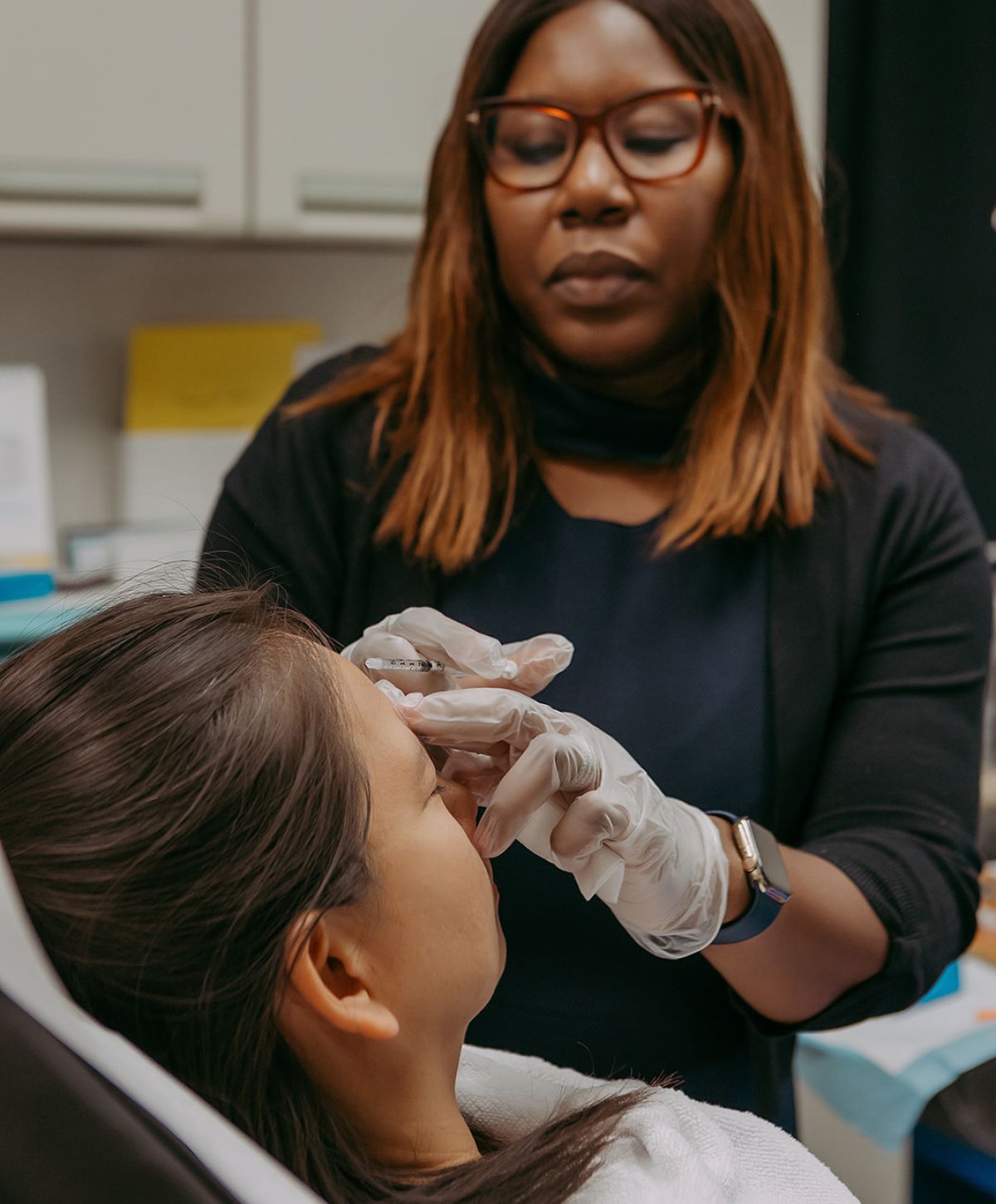 Client receiving a cosmetic treatment in clinic.