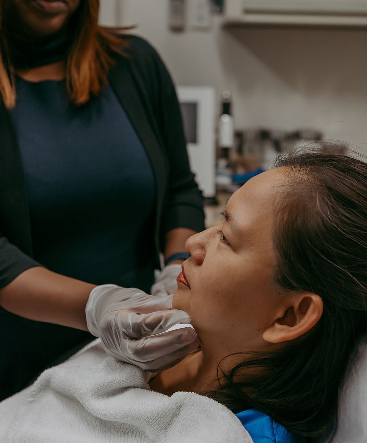 Skin treatment session with a patient.